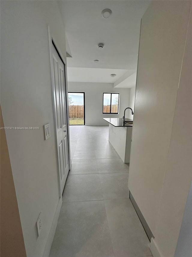 hallway featuring sink