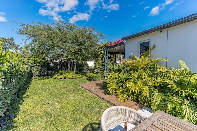 view of yard featuring a deck