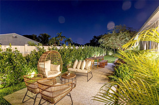 view of patio at night