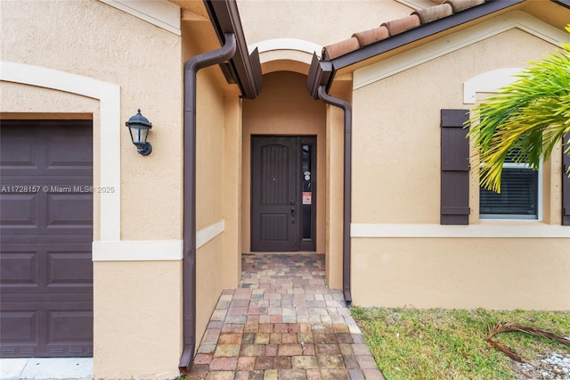 entrance to property with a garage