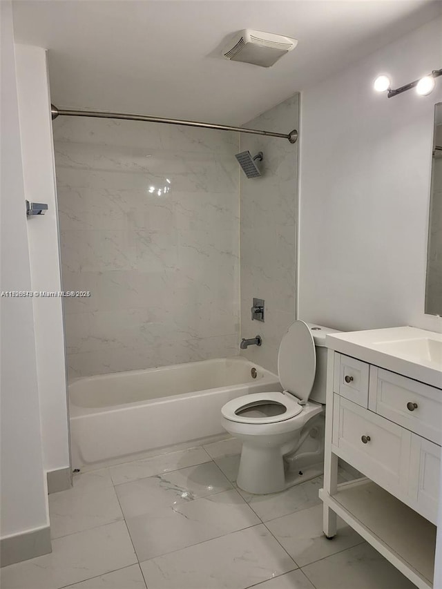 full bathroom with toilet, tiled shower / bath combo, and vanity