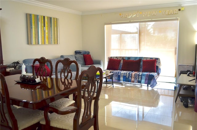 tiled dining space featuring crown molding