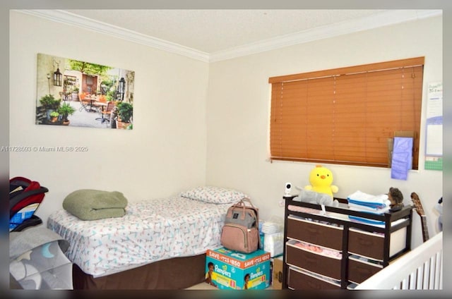 bedroom featuring ornamental molding