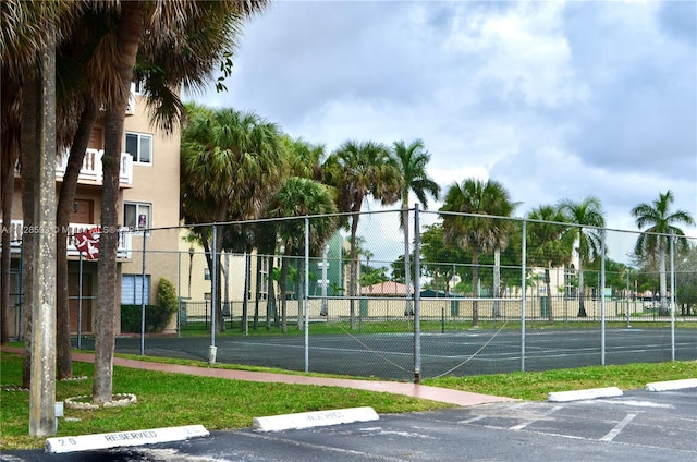 exterior space with tennis court