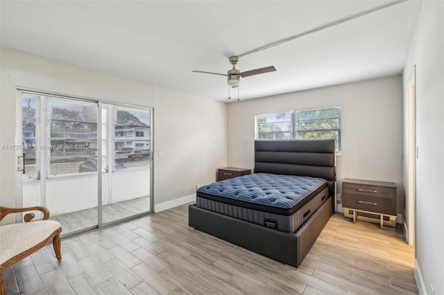 bedroom featuring ceiling fan and light hardwood / wood-style floors