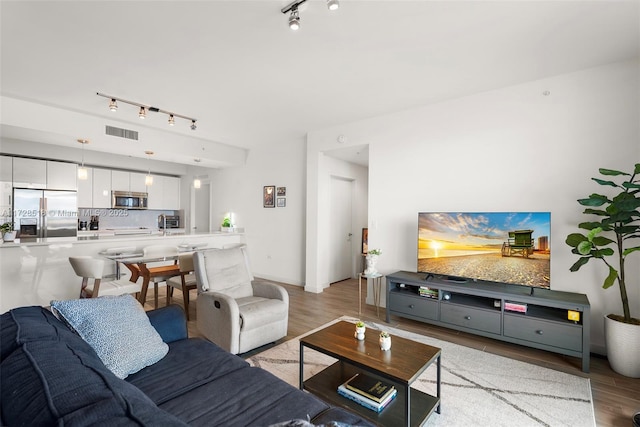 living room featuring light hardwood / wood-style flooring