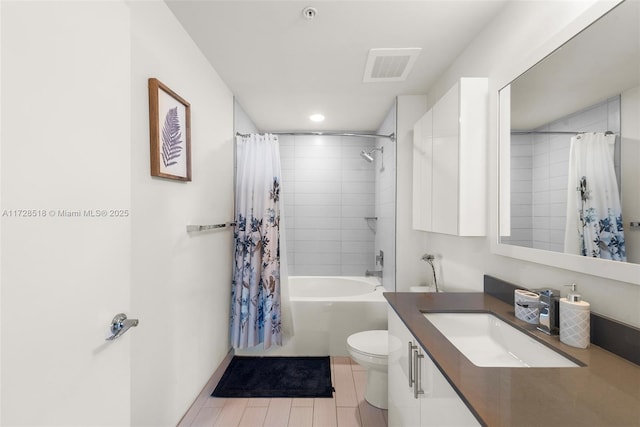 full bathroom featuring toilet, vanity, and shower / bath combination with curtain