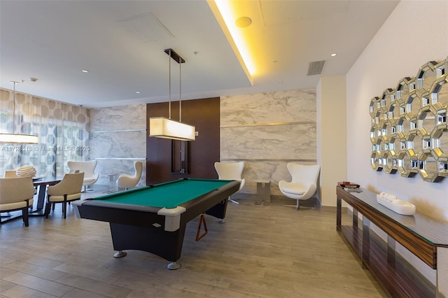 recreation room featuring hardwood / wood-style floors, billiards, and tile walls