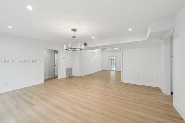 299 S Biscayne River Dr, Miami, FL 33169 - unfurnished living room featuring a chandelier, light wood-style flooring, recessed lighting, and baseboards