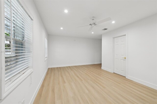 299 S Biscayne River Dr, Miami, FL 33169 - spare room with light wood-style flooring, recessed lighting, ceiling fan, and baseboards