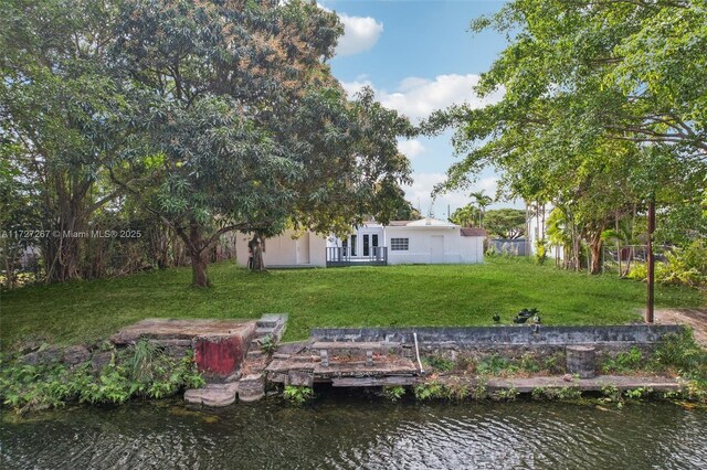 exterior space with a water view