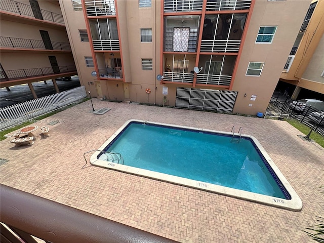 view of pool featuring a patio