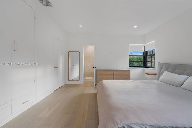 unfurnished bedroom with light hardwood / wood-style flooring