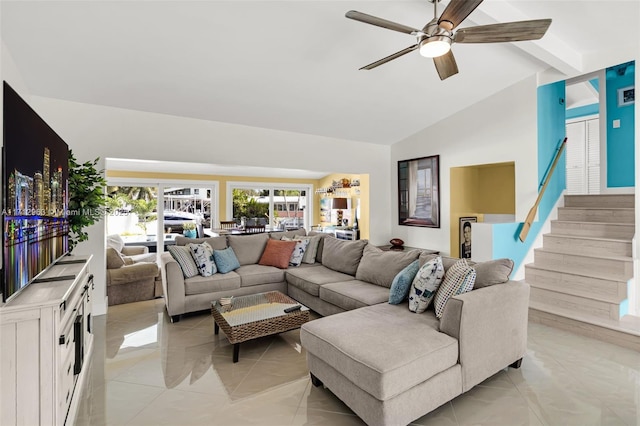 living room with ceiling fan, light tile patterned floors, and vaulted ceiling with beams