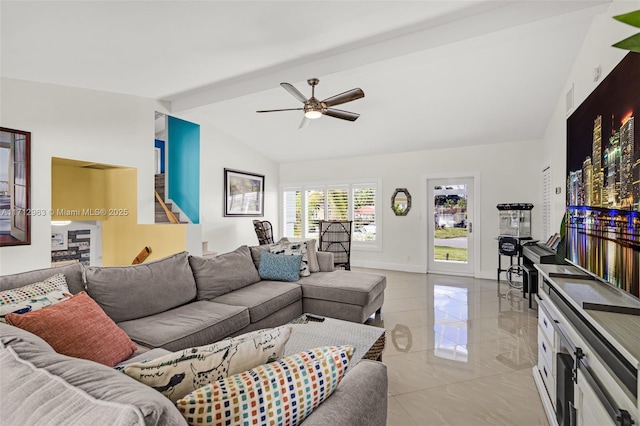 living room featuring ceiling fan and lofted ceiling with beams