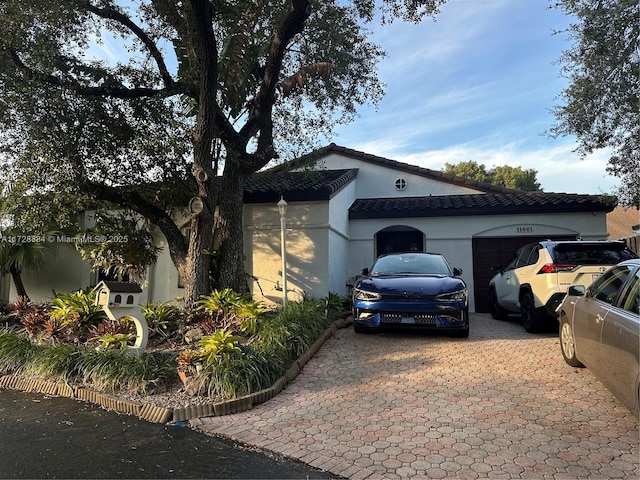 view of property exterior featuring a garage