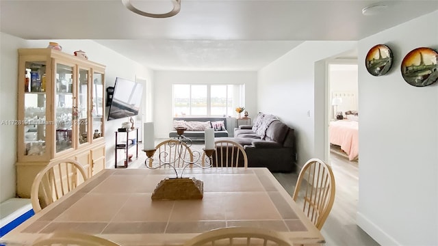 dining room featuring light hardwood / wood-style floors