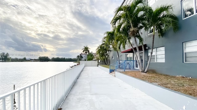 exterior space with a water view