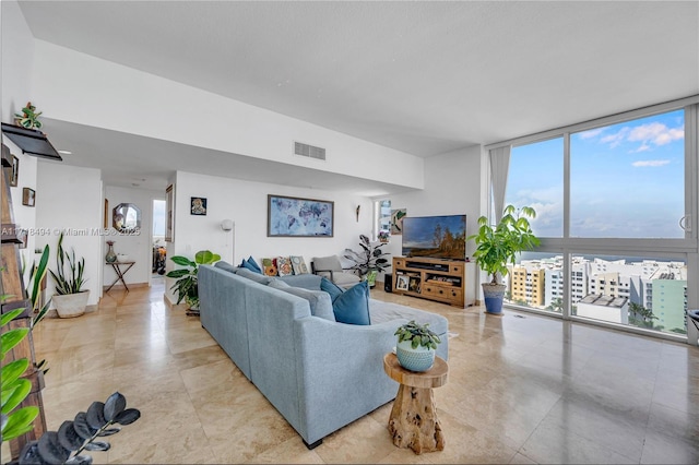 living room featuring expansive windows