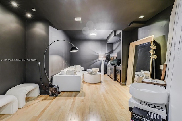 bathroom featuring wood-type flooring