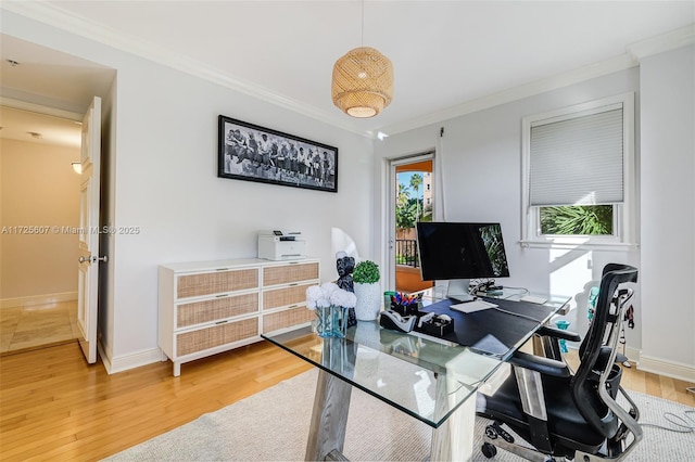 office area featuring hardwood / wood-style flooring and ornamental molding