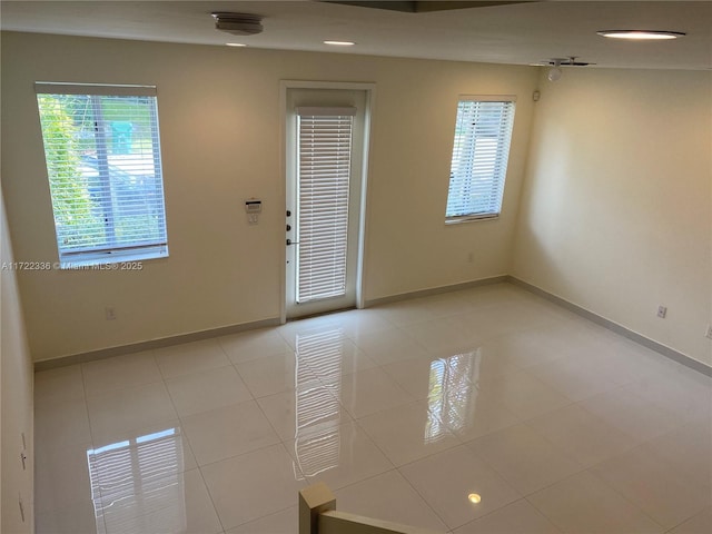 view of tiled spare room