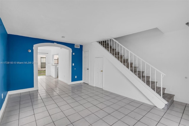 interior space featuring light tile patterned flooring