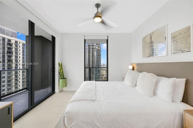 bedroom with floor to ceiling windows, access to outside, and ceiling fan