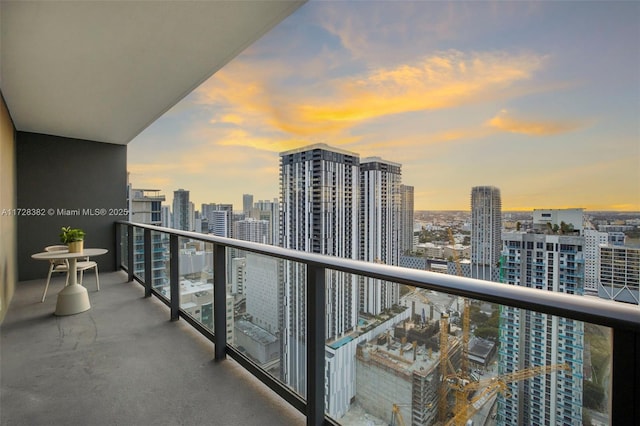 view of balcony at dusk