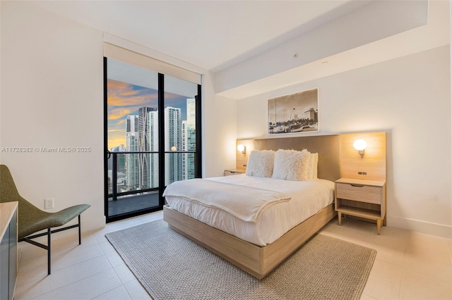 bedroom with access to outside, light tile patterned floors, and floor to ceiling windows