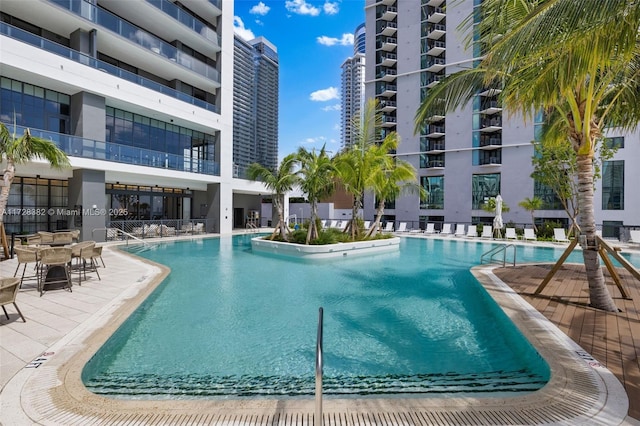 view of swimming pool featuring a patio