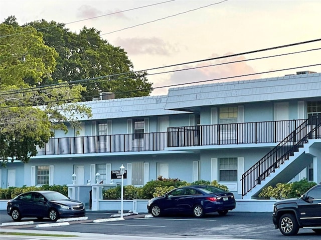 view of outdoor building at dusk