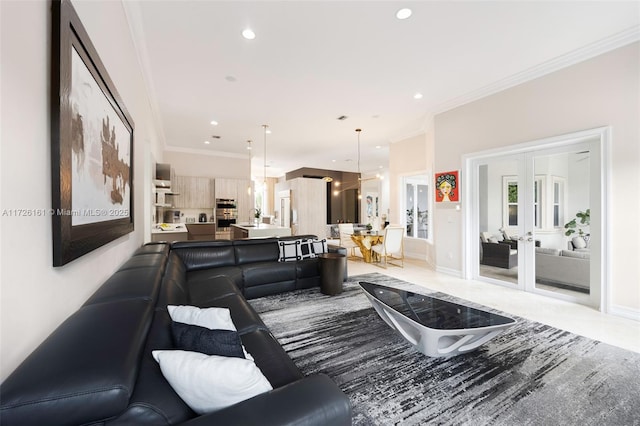 living room featuring ornamental molding and french doors