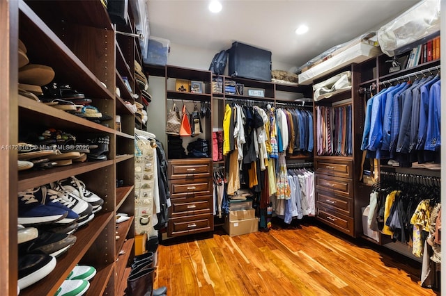 spacious closet featuring light wood-type flooring