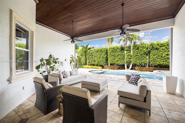 view of patio with ceiling fan, a fenced in pool, and an outdoor living space