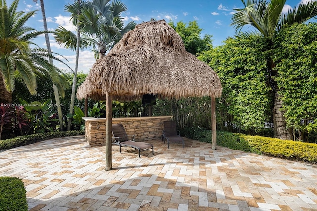 view of patio / terrace featuring exterior bar