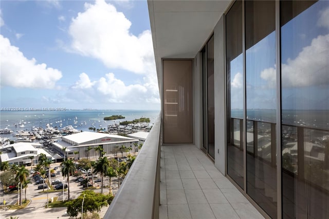 balcony featuring a water view