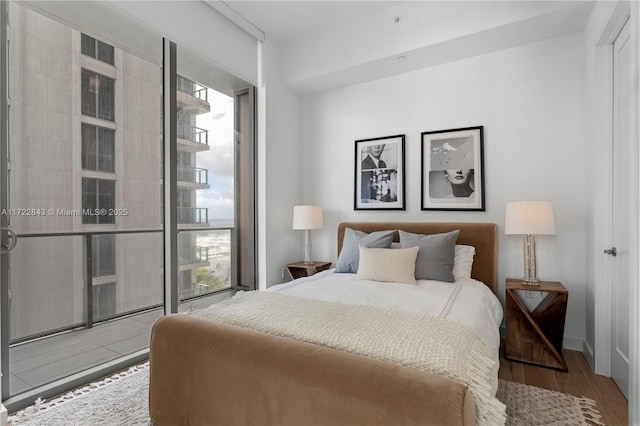 bedroom featuring wood-type flooring