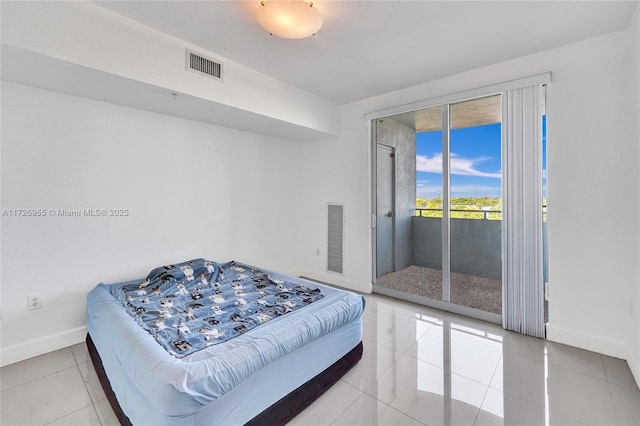 tiled bedroom with access to exterior