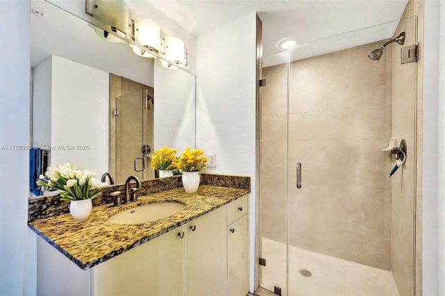 bathroom featuring vanity and walk in shower