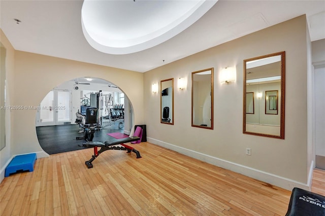 exercise room featuring light hardwood / wood-style flooring