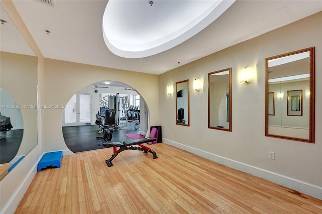 exercise room featuring light hardwood / wood-style flooring