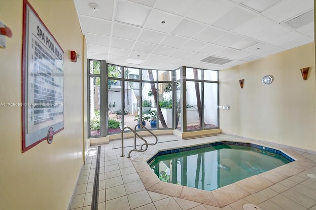 view of pool featuring an indoor hot tub