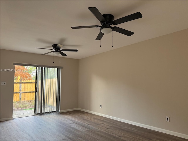 unfurnished room with hardwood / wood-style floors