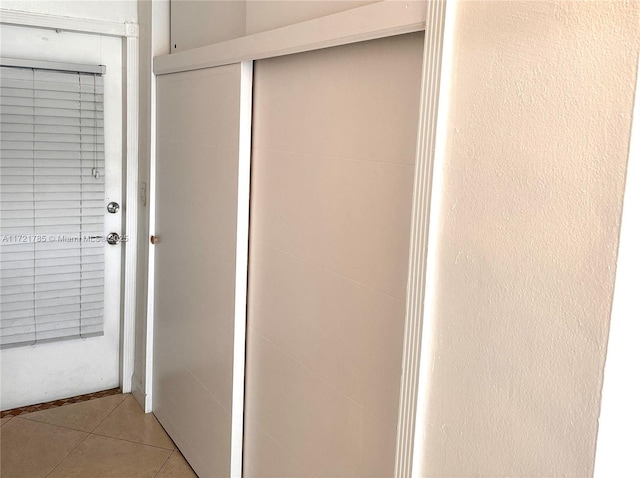 interior space with tile patterned floors