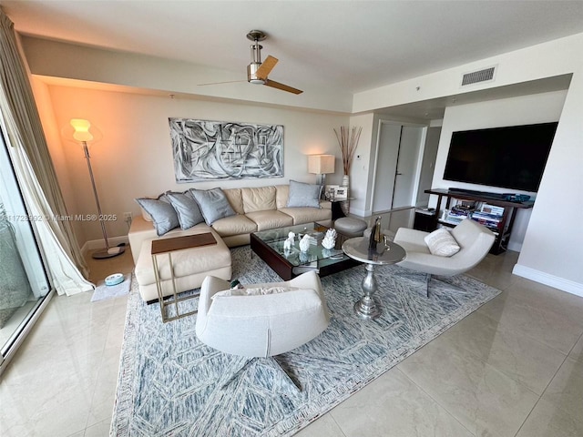 living room featuring ceiling fan