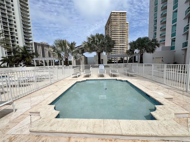 view of pool featuring a patio area and a pergola