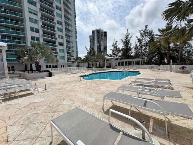 view of pool featuring a patio area