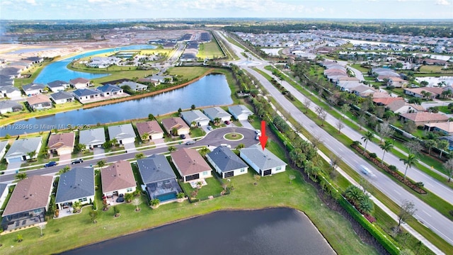 drone / aerial view featuring a water view