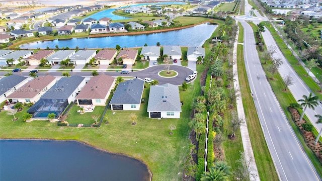 bird's eye view with a water view